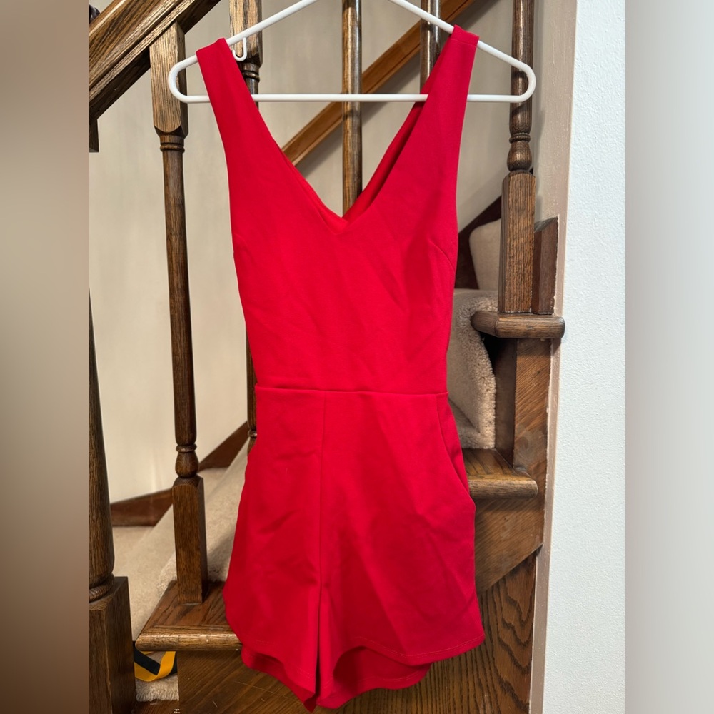 Red dressy romper with open back